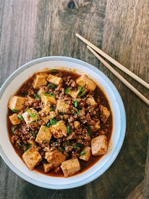  Mapo Tofu: Un connubio piccante e cremoso per un'esperienza culinaria indimenticabile!