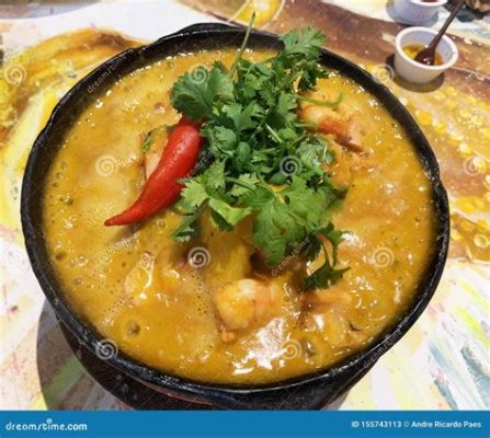  Moqueca! Una Sinfonia di Sapori Frutti e Spezie che Danzano sulla Lingua